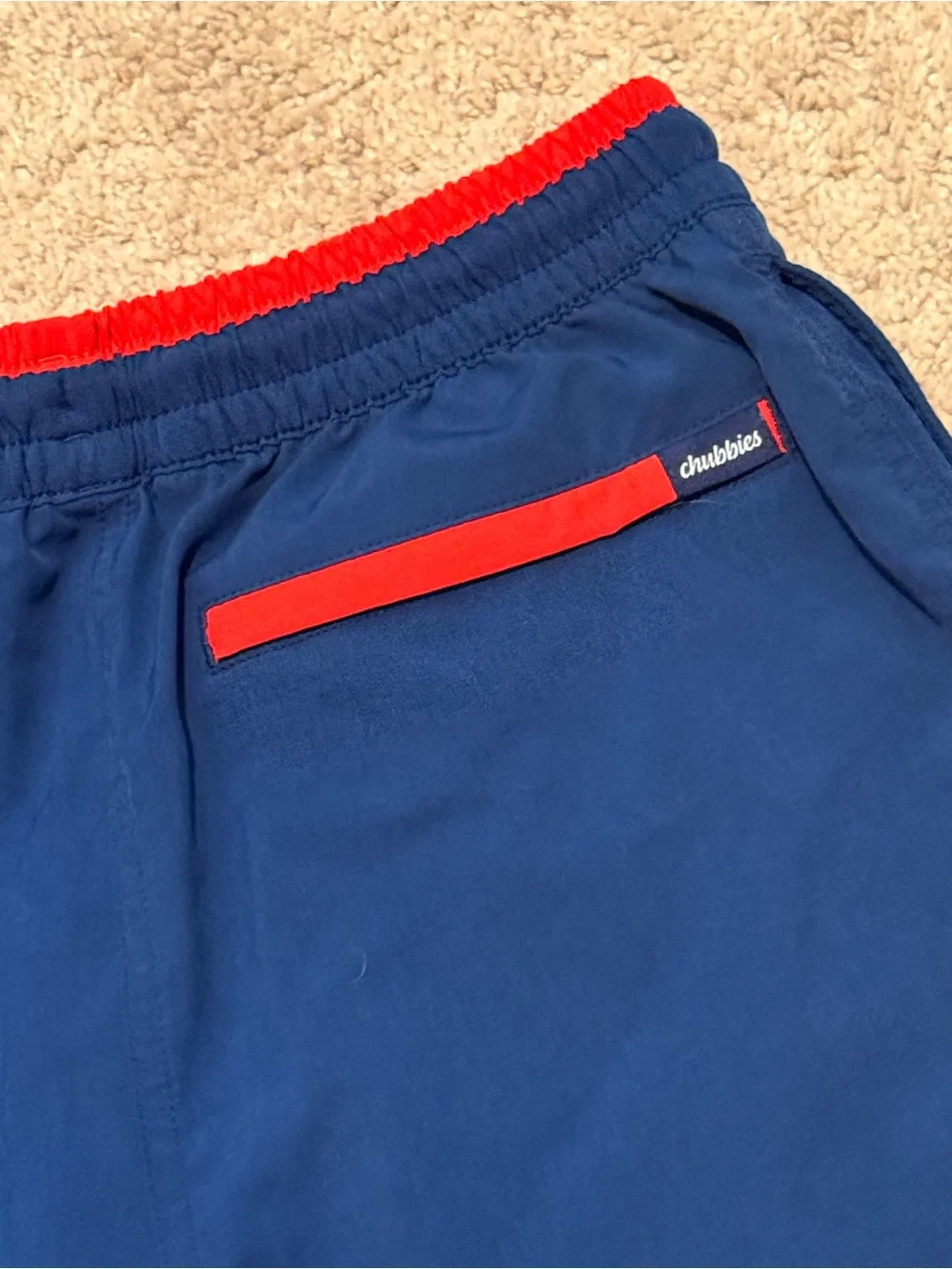 chubbies Navy Swim Trunks with Red Waistband
